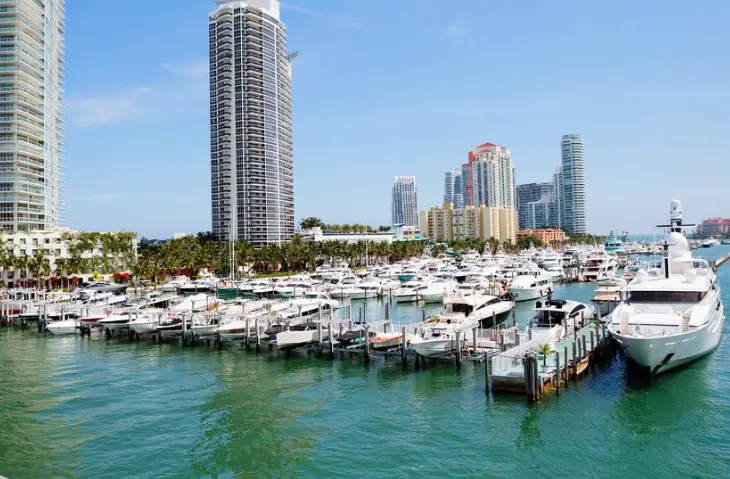 Yachts large and small moored in Miami Boat Show harbour