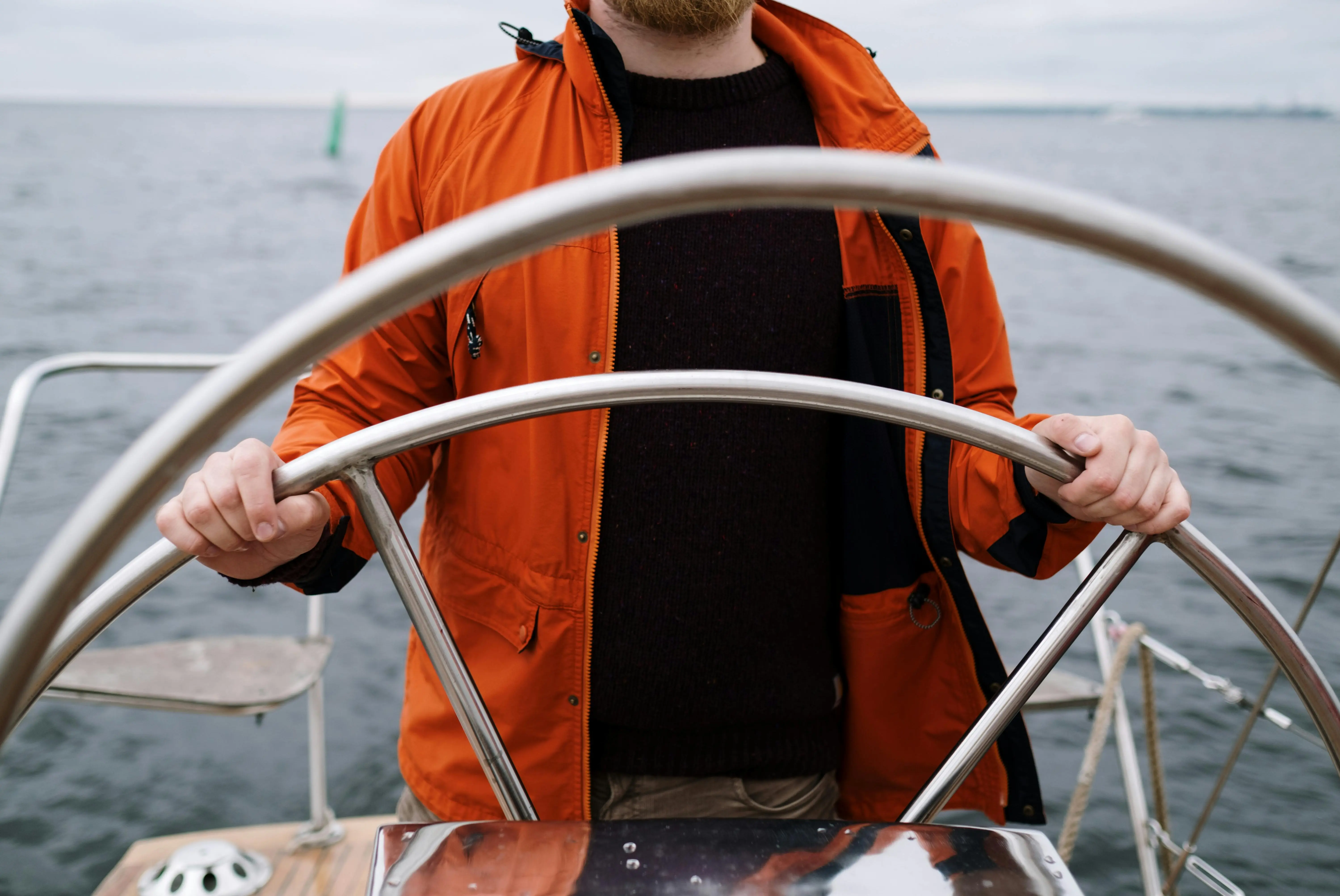 The captain is driving the yacht