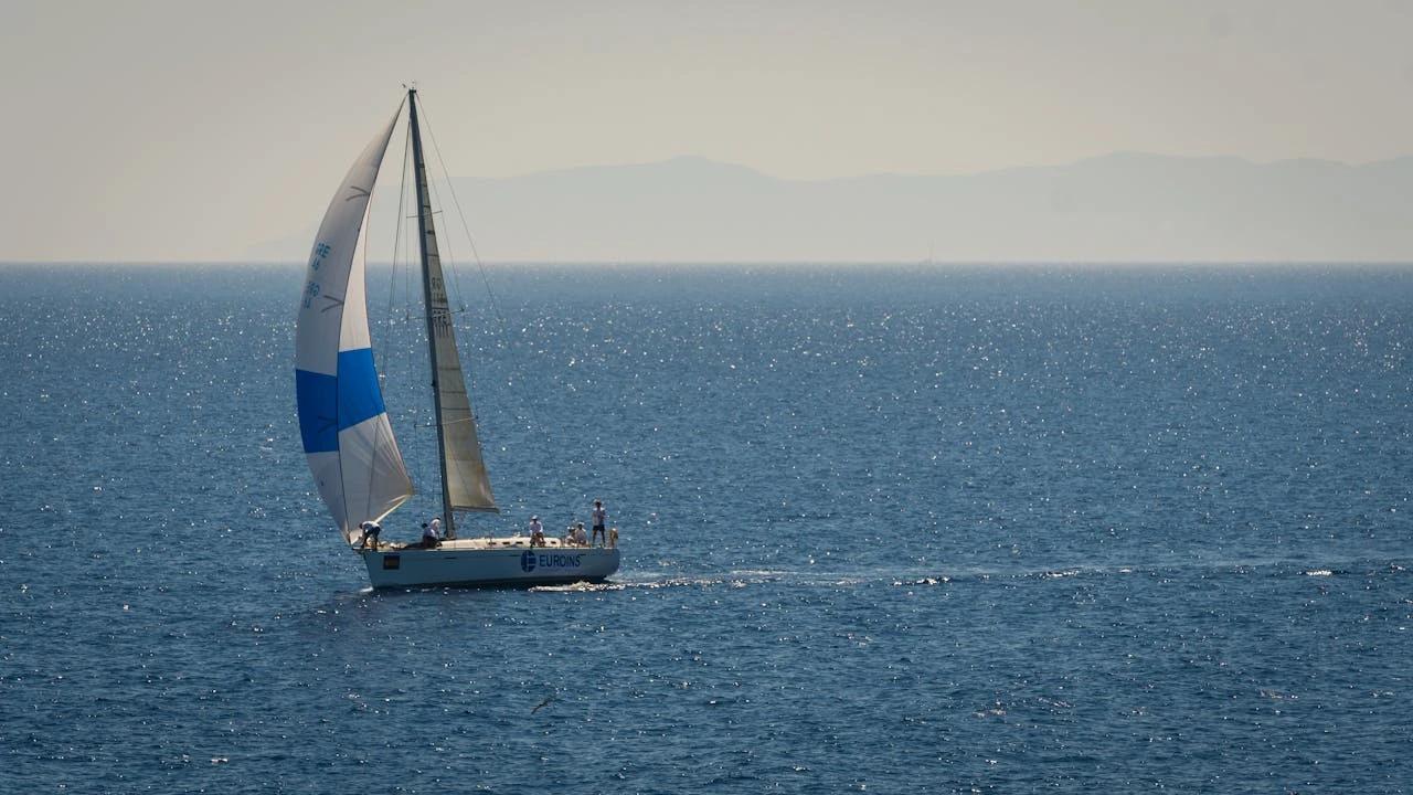 Sailboat travelling on the sea